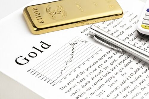 Goldbar on text and silver pen